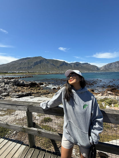 Trendy oversized hoodie featuring olive branch key graphic design